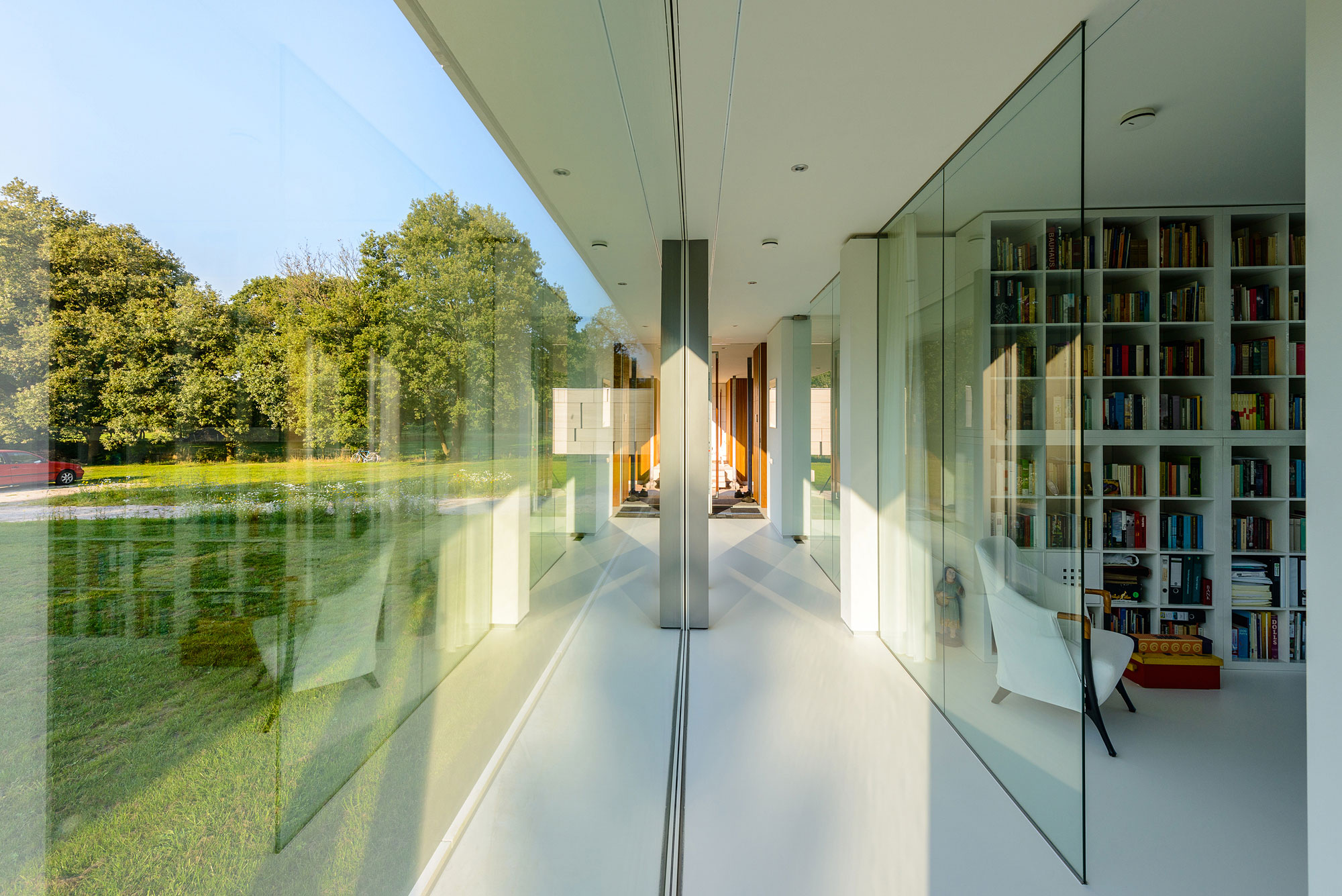 An Elegant and Captivating Modern Transparent House Behind a Grove of Trees in Bontebok, The Netherlands by Inbo (14)