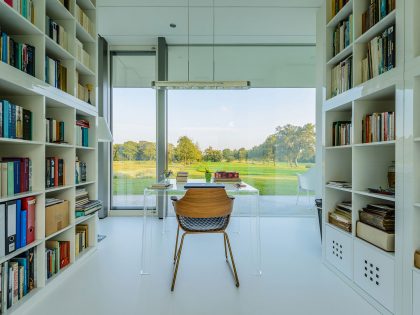 An Elegant and Captivating Modern Transparent House Behind a Grove of Trees in Bontebok, The Netherlands by Inbo (15)