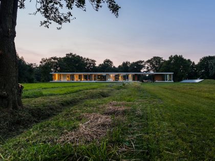 An Elegant and Captivating Modern Transparent House Behind a Grove of Trees in Bontebok, The Netherlands by Inbo (16)