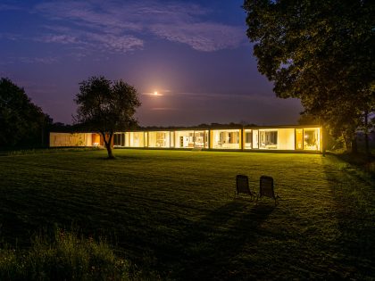 An Elegant and Captivating Modern Transparent House Behind a Grove of Trees in Bontebok, The Netherlands by Inbo (17)