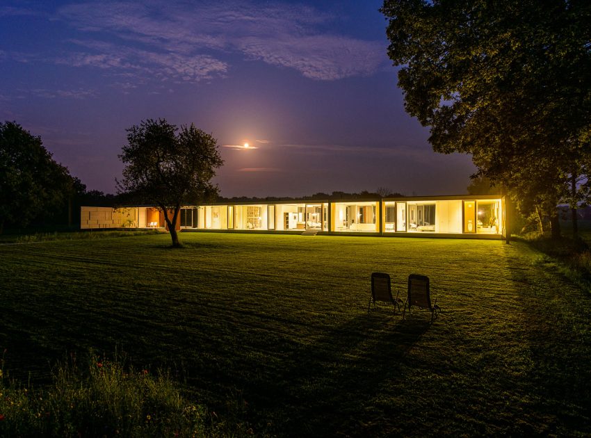 An Elegant and Captivating Modern Transparent House Behind a Grove of Trees in Bontebok, The Netherlands by Inbo (17)