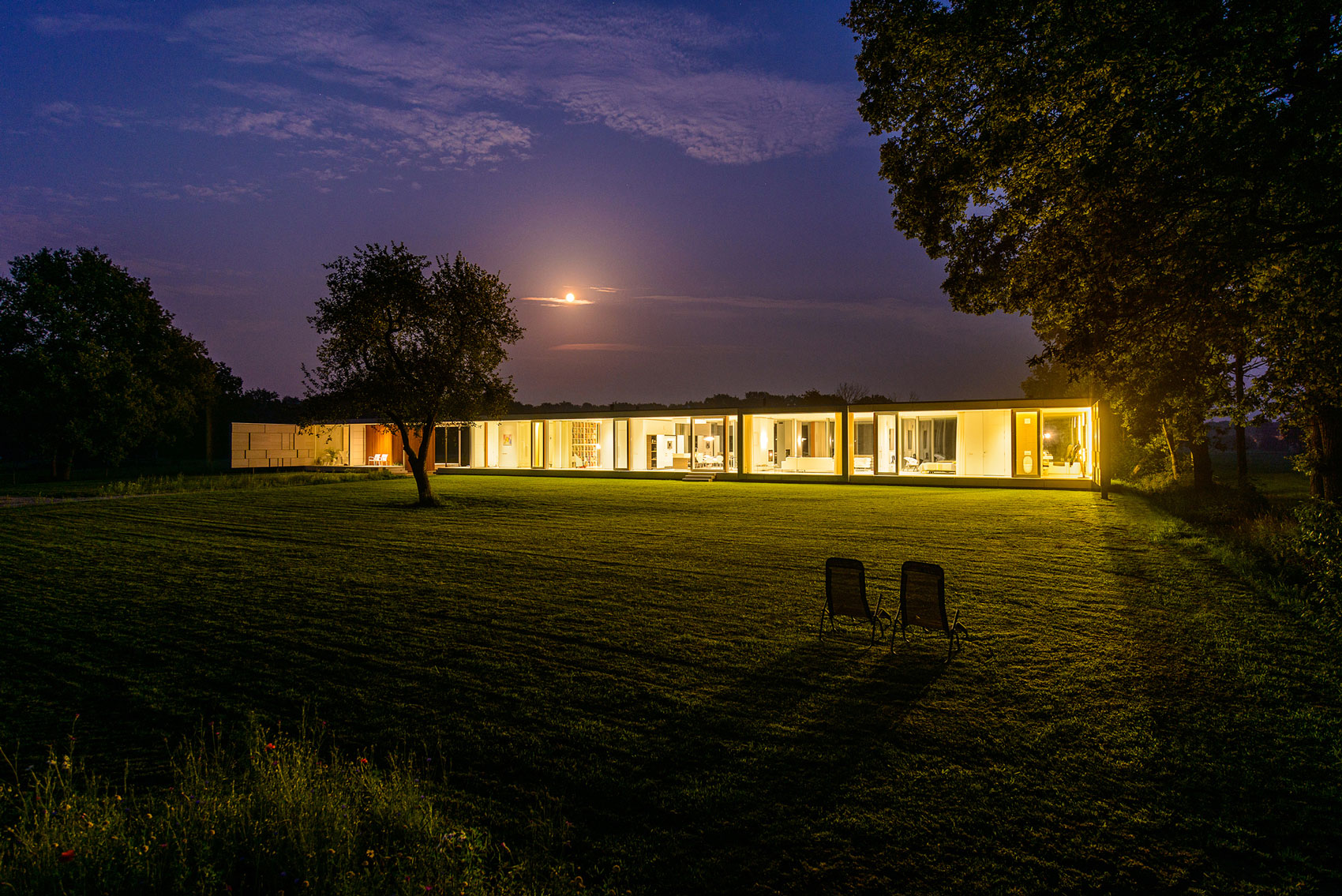 An Elegant and Captivating Modern Transparent House Behind a Grove of Trees in Bontebok, The Netherlands by Inbo (17)