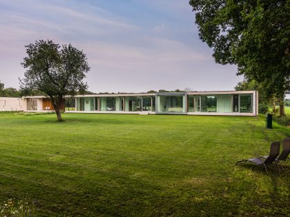 An Elegant and Captivating Modern Transparent House Behind a Grove of Trees in Bontebok, The Netherlands by Inbo (2)