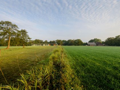 An Elegant and Captivating Modern Transparent House Behind a Grove of Trees in Bontebok, The Netherlands by Inbo (5)