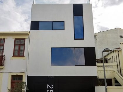 A Unique Minimalist Home with Neutral Colors and Industrial Materials in Espinho, Portugal