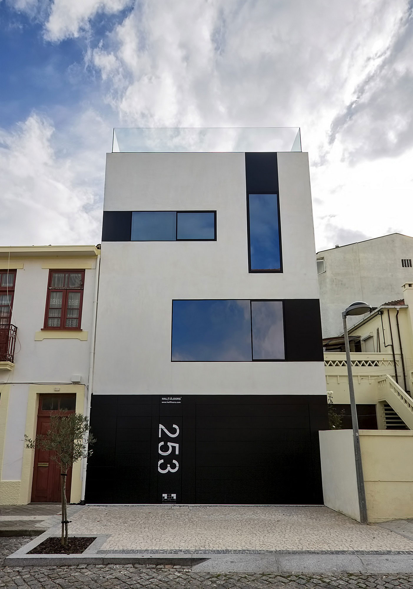 A Unique Minimalist Home with Neutral Colors and Industrial Materials in Espinho, Portugal by Pedro Brito (1)