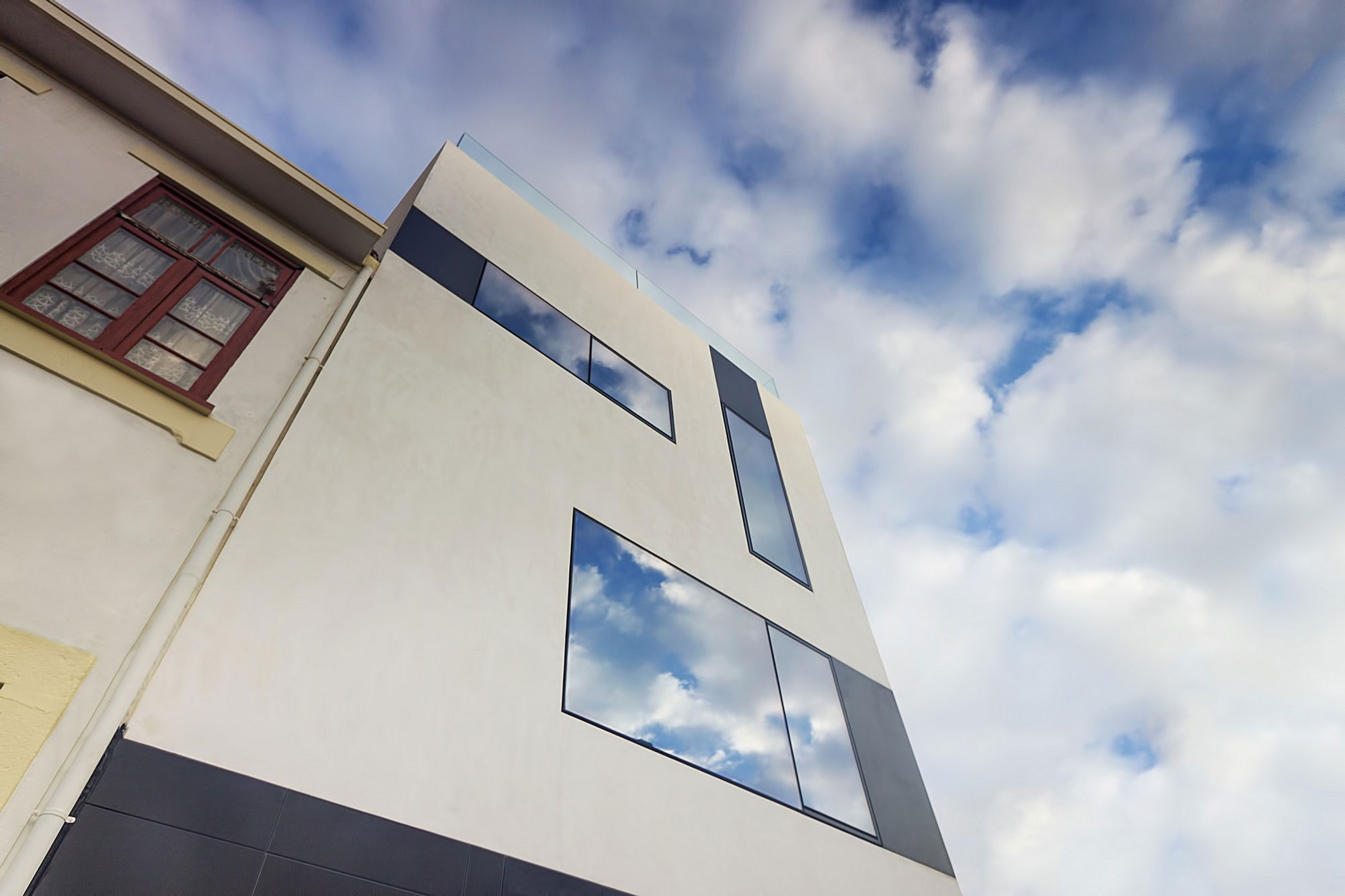 A Unique Minimalist Home with Neutral Colors and Industrial Materials in Espinho, Portugal by Pedro Brito (3)