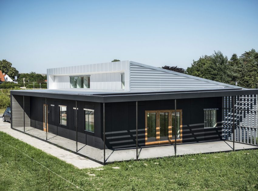 A Warm Contemporary Home Made From Recycled Shipping Containers Materials in Nyborg, Denmark by Lendager Arkitekter (1)