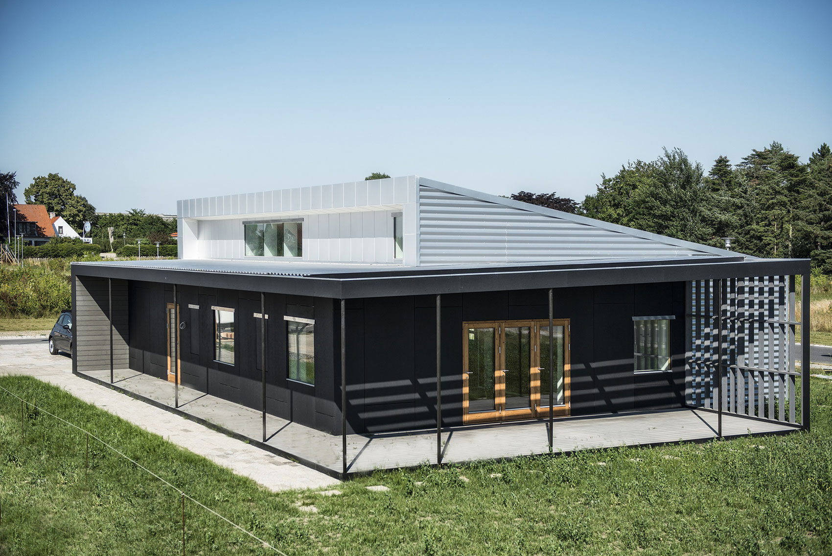 A Warm Contemporary Home Made From Recycled Shipping Containers Materials in Nyborg, Denmark by Lendager Arkitekter (1)