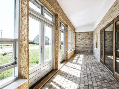 A Warm Contemporary Home Made From Recycled Shipping Containers Materials in Nyborg, Denmark by Lendager Arkitekter (10)