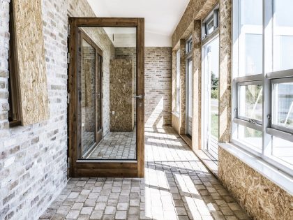 A Warm Contemporary Home Made From Recycled Shipping Containers Materials in Nyborg, Denmark by Lendager Arkitekter (11)
