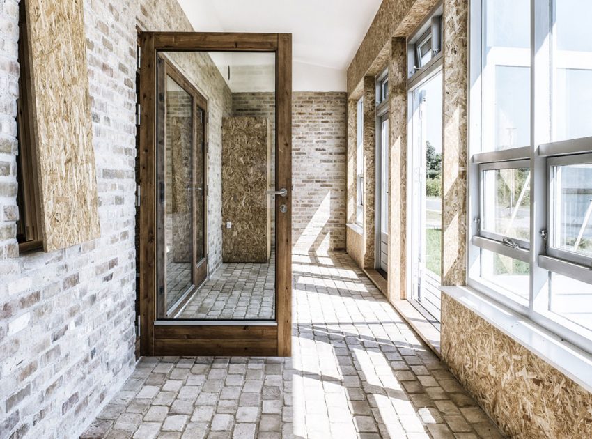 A Warm Contemporary Home Made From Recycled Shipping Containers Materials in Nyborg, Denmark by Lendager Arkitekter (11)