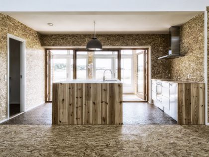 A Warm Contemporary Home Made From Recycled Shipping Containers Materials in Nyborg, Denmark by Lendager Arkitekter (15)