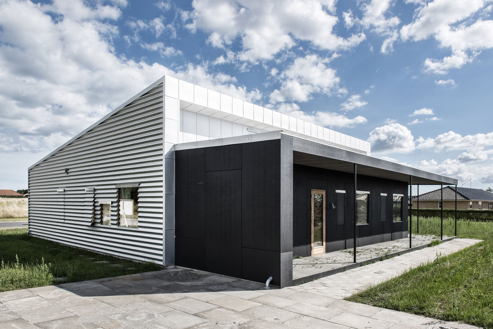 A Warm Contemporary Home Made From Recycled Shipping Containers Materials in Nyborg, Denmark by Lendager Arkitekter (2)