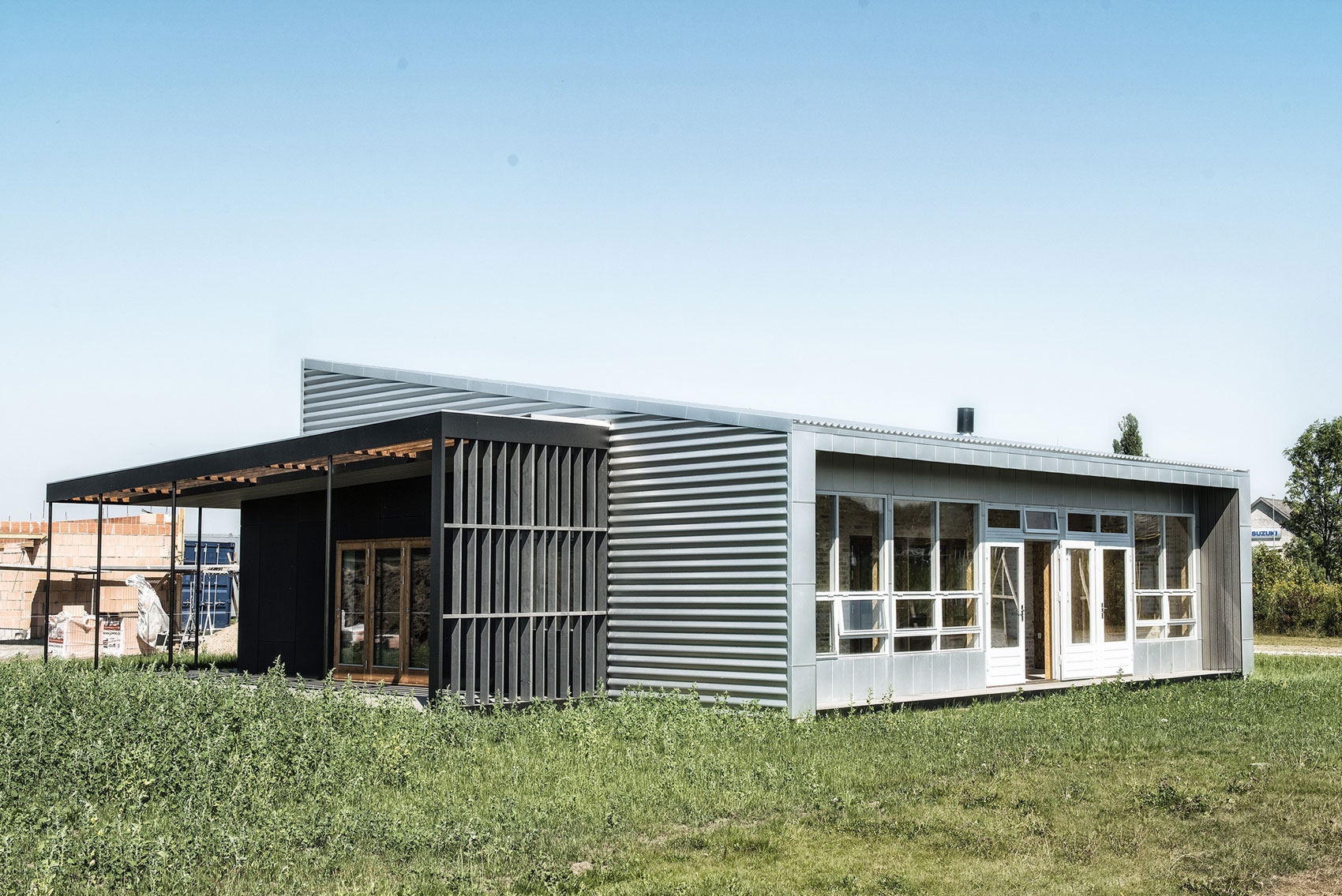 A Warm Contemporary Home Made From Recycled Shipping Containers Materials in Nyborg, Denmark by Lendager Arkitekter (3)