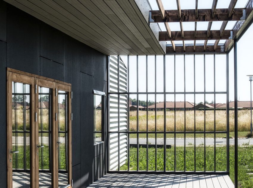 A Warm Contemporary Home Made From Recycled Shipping Containers Materials in Nyborg, Denmark by Lendager Arkitekter (7)