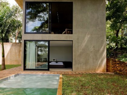 A Warm and Cozy Modern Home with Beautiful Courtyards and Pool in Goiânia, Brazil by Leo Romano (3)