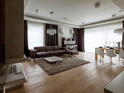 A Warm and Elegant Duplex Apartment with Comfortable Interiors in Warsaw