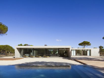 An Elegant Concrete and Glass Home with Warm and Cozy Interior in Comporta, Portugal by RRJ Arquitectos (1)