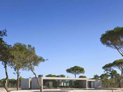 An Elegant Concrete and Glass Home with Warm and Cozy Interior in Comporta, Portugal by RRJ Arquitectos (2)