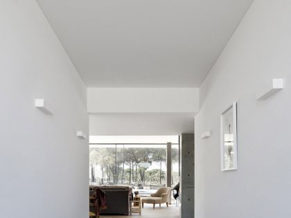 An Elegant Concrete and Glass Home with Warm and Cozy Interior in Comporta, Portugal by RRJ Arquitectos (9)