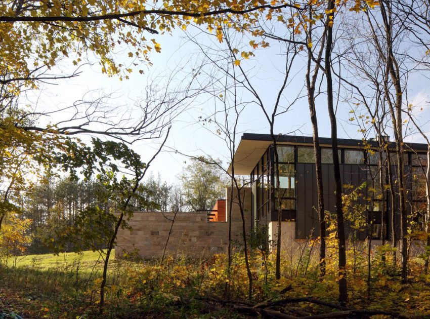 An Elegant Concrete and Steel Home with Stone, Wood and Glass Elements in Richfield, Wisconsin by Bruns Architecture (1)