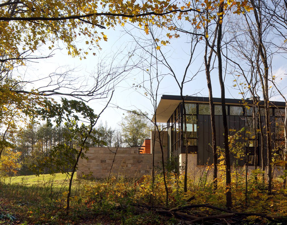 An Elegant Concrete and Steel Home with Stone, Wood and Glass Elements in Richfield, Wisconsin by Bruns Architecture (1)