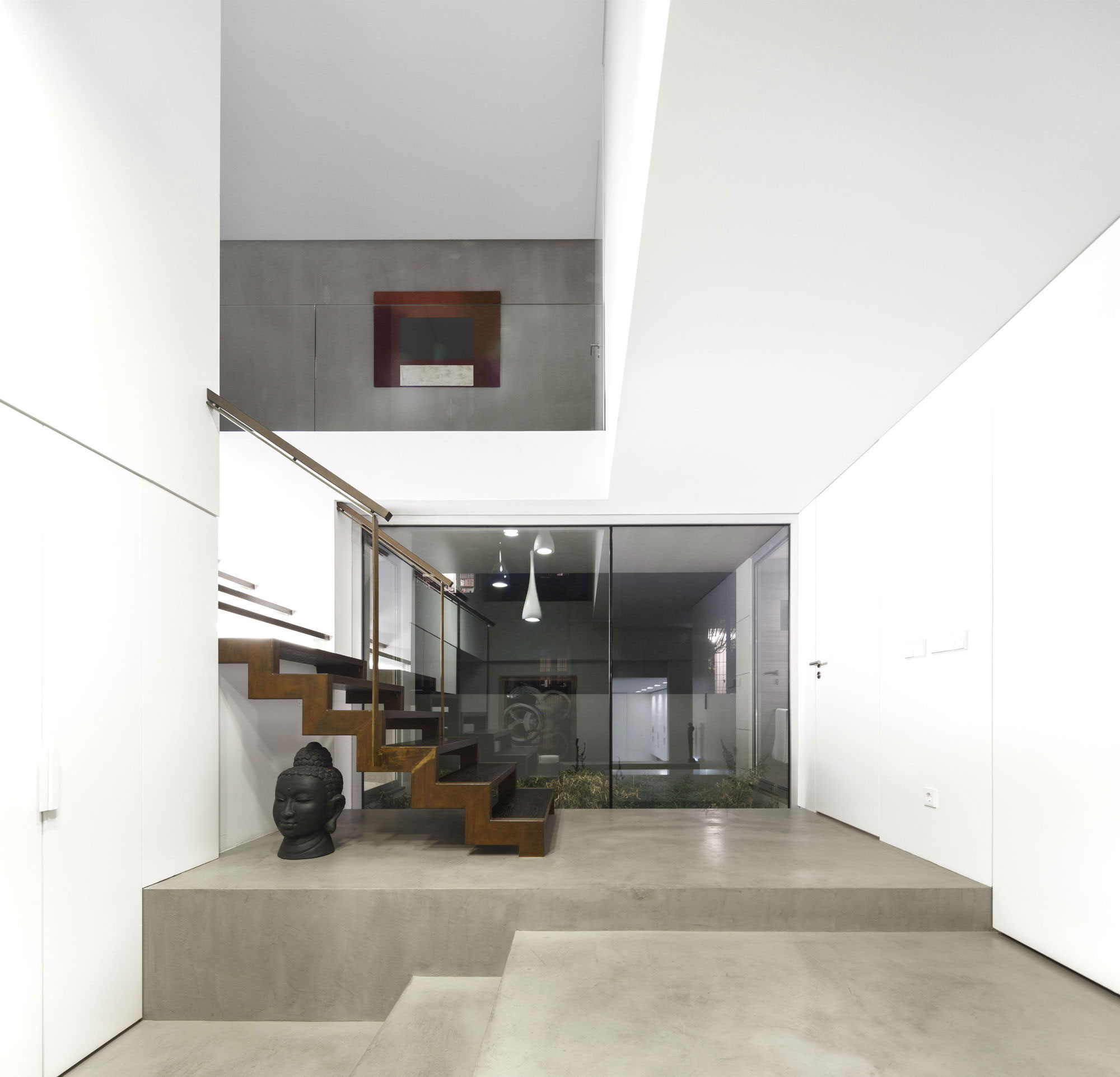 An Elegant Modern Rectangular-Shaped House with Joyful Interiors in Restelo, Portugal by Leonor Duarte Ferreira & pmc arquitectos (7)