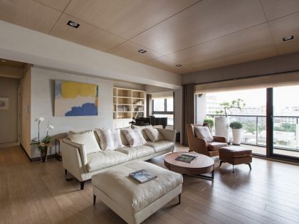 An Elegant and Spacious Modern Apartment with Warm Interiors in Taiwan