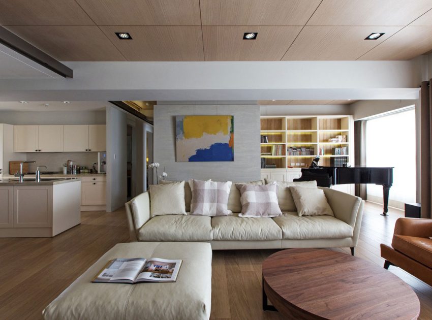 An Elegant and Spacious Modern Apartment with Warm Interiors in Taiwan by PMK+designers (2)