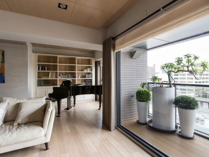 An Elegant and Spacious Modern Apartment with Warm Interiors in Taiwan by PMK+designers (4)