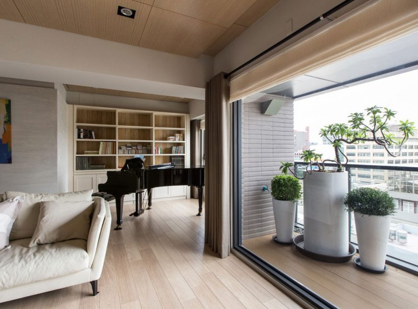 An Elegant and Spacious Modern Apartment with Warm Interiors in Taiwan by PMK+designers (4)