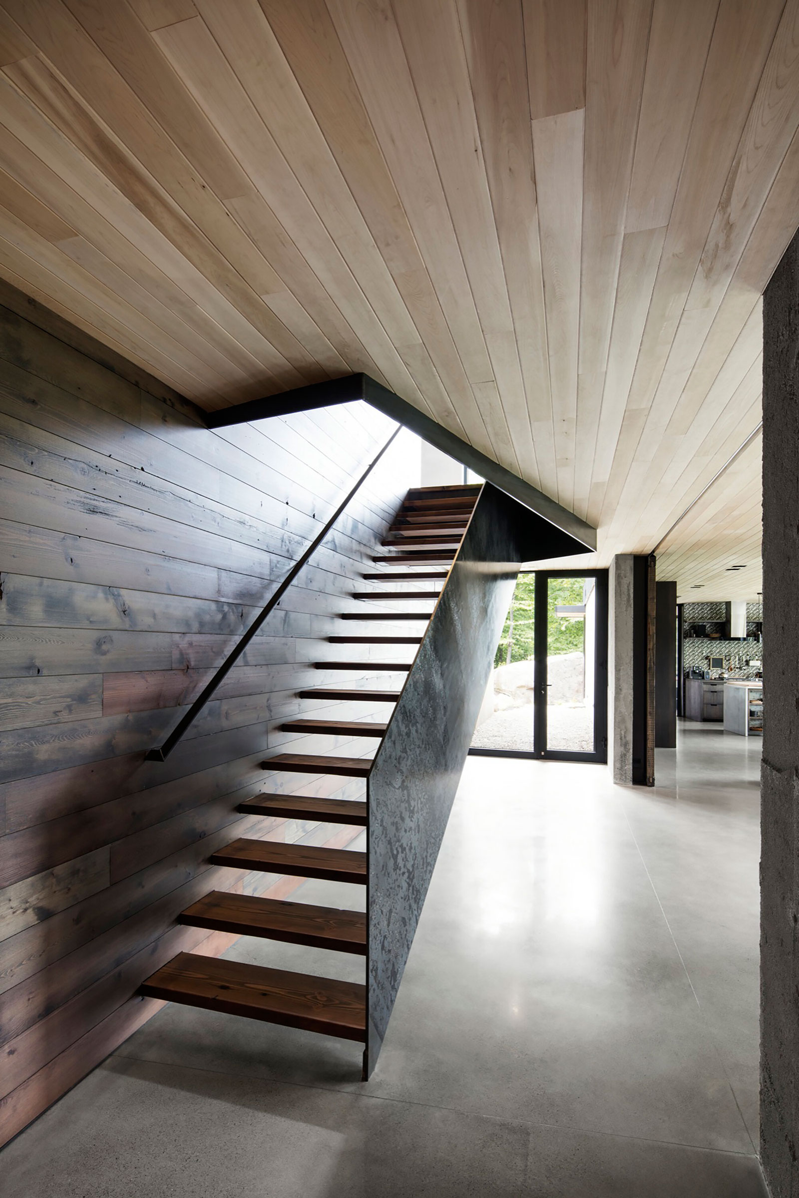 An Elegant and Sustainable Contemporary Home Overlooking the Wooded Landscape in Wentworth by Alain Carle Architecte (17)