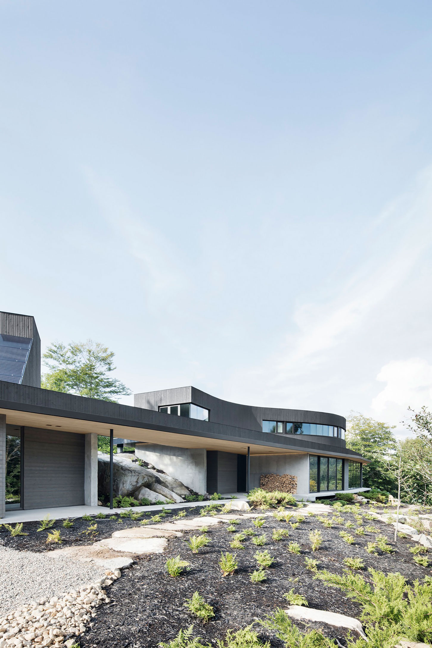An Elegant and Sustainable Contemporary Home Overlooking the Wooded Landscape in Wentworth by Alain Carle Architecte (2)