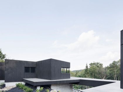 An Elegant and Sustainable Contemporary Home Overlooking the Wooded Landscape in Wentworth by Alain Carle Architecte (4)