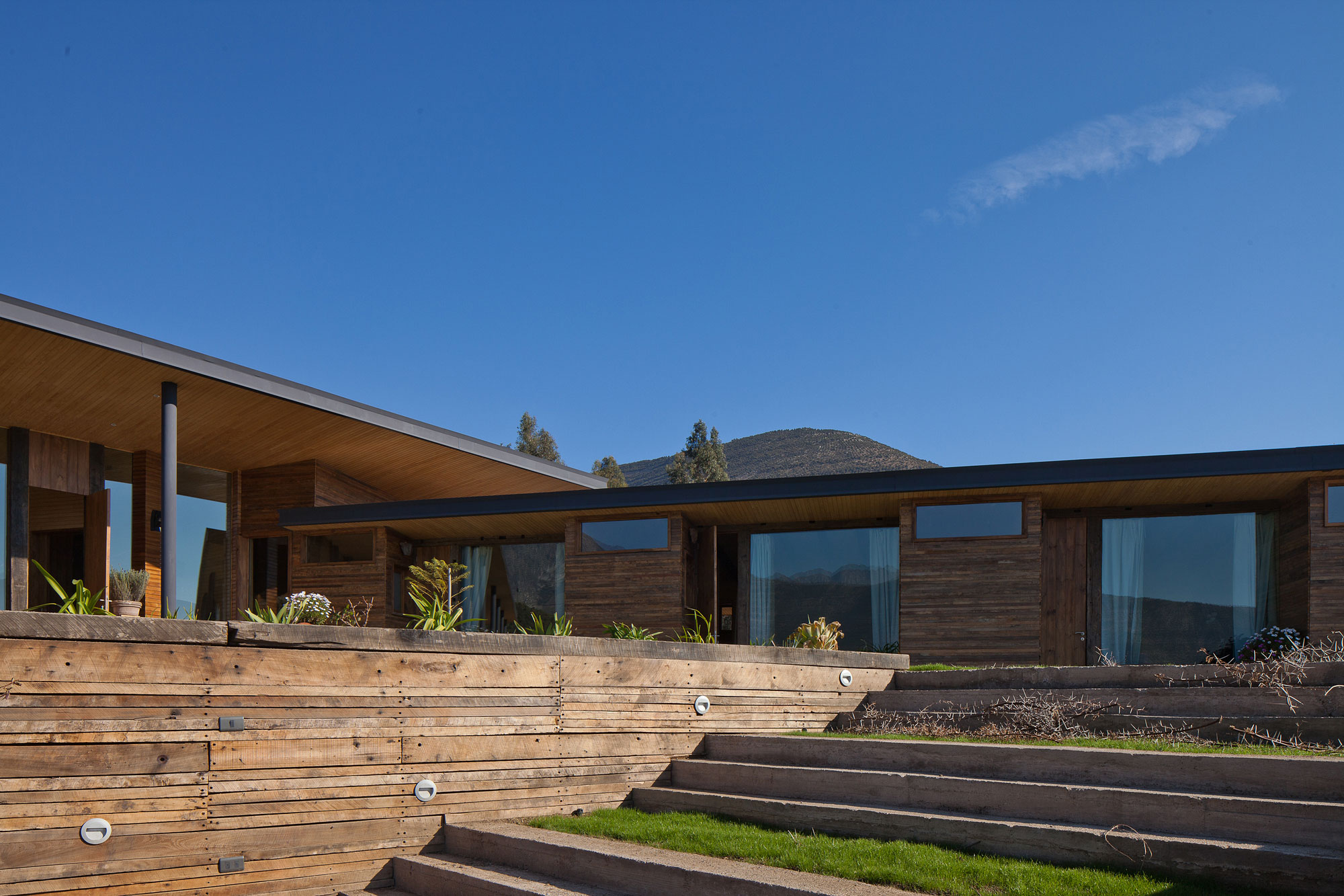 An Exquisite Contemporary Home with an Exterior Made of Recycled Wood Paneling in Panquehue by Dörr + Schmidt (1)