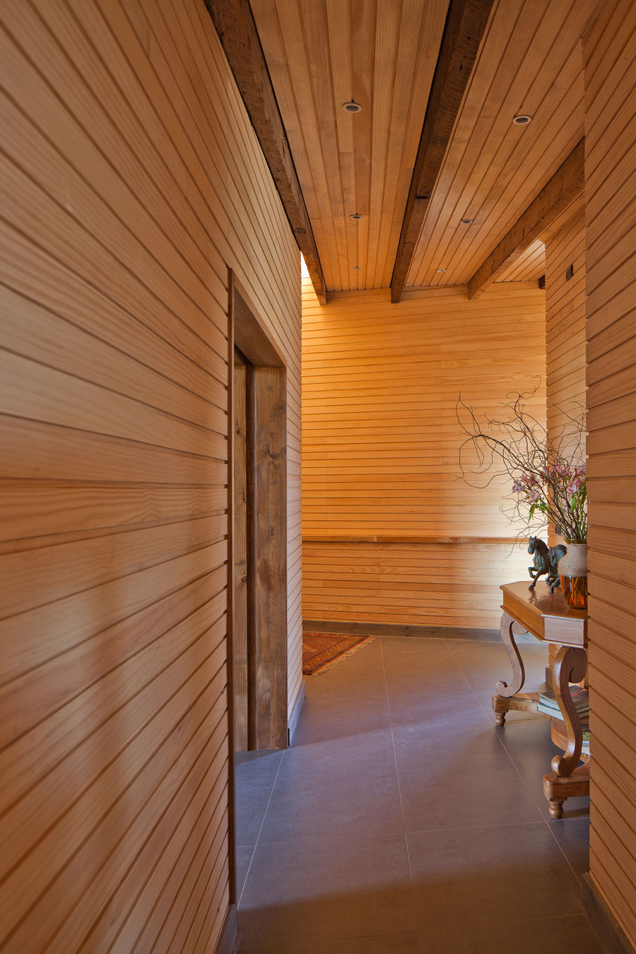 An Exquisite Contemporary Home with an Exterior Made of Recycled Wood Paneling in Panquehue by Dörr + Schmidt (5)