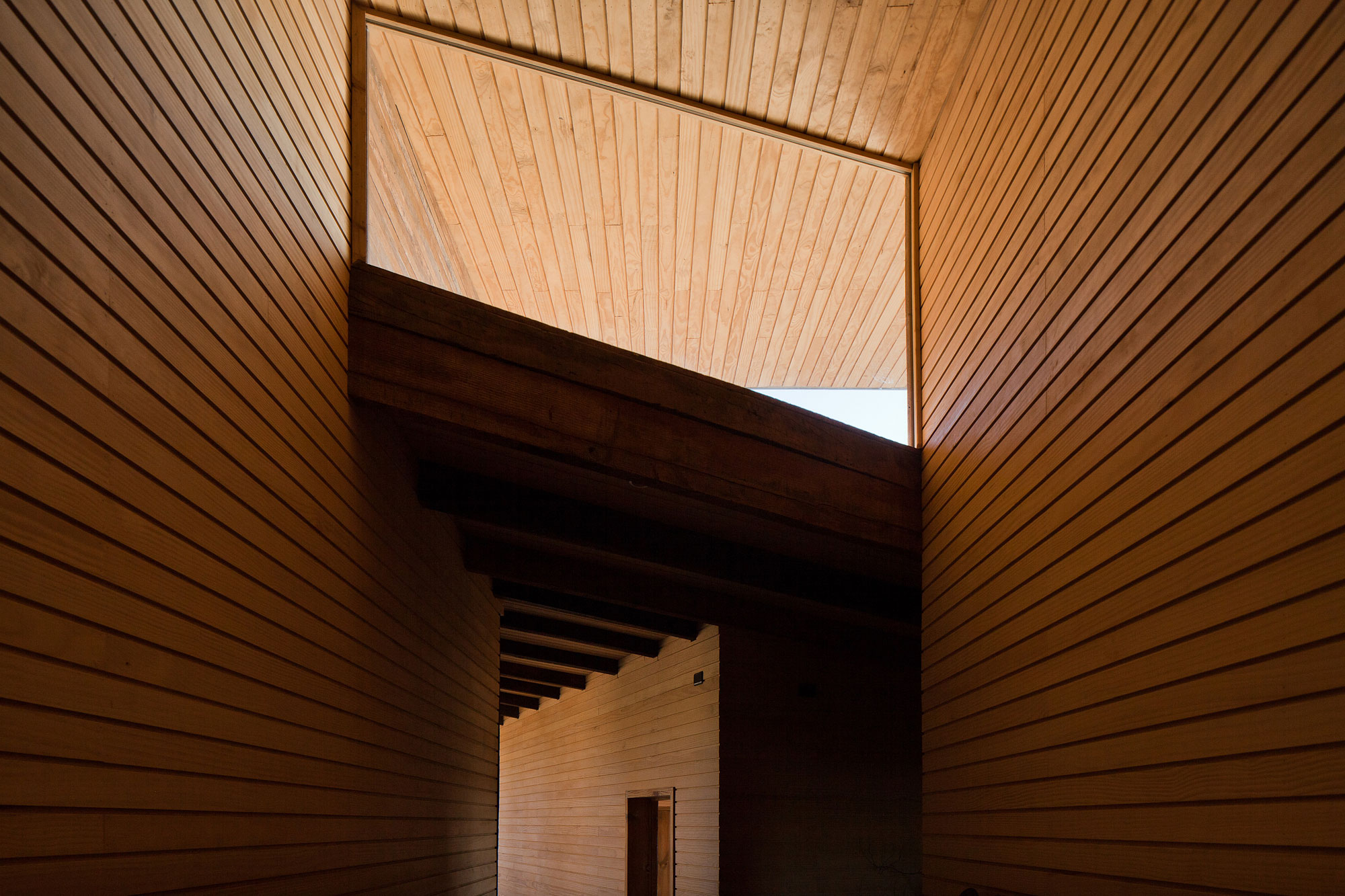 An Exquisite Contemporary Home with an Exterior Made of Recycled Wood Paneling in Panquehue by Dörr + Schmidt (8)