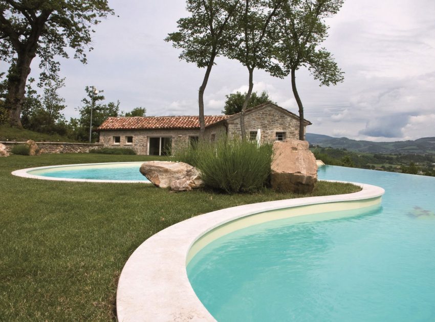An Exquisite Home with Stunning Rough Stone Walls and Thick Ceiling Beams in Pergola, Italy by Aldo Simoncelli (1)