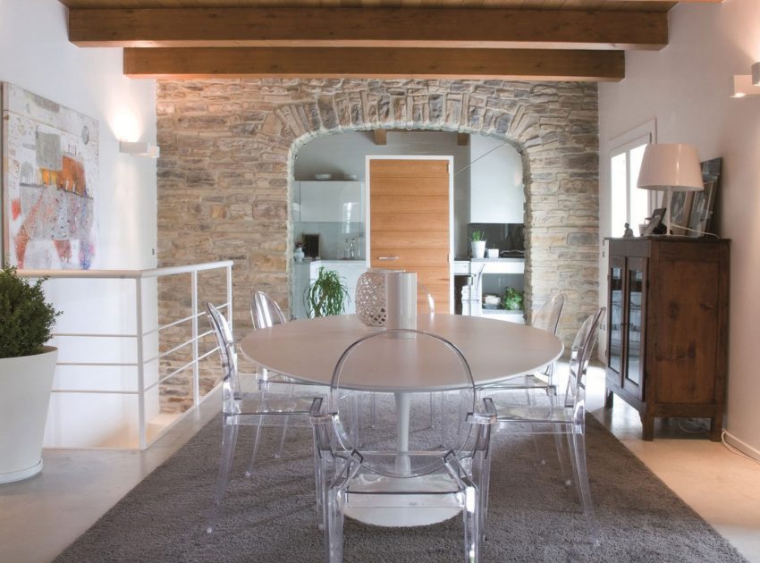 An Exquisite Home with Stunning Rough Stone Walls and Thick Ceiling Beams in Pergola, Italy by Aldo Simoncelli (11)