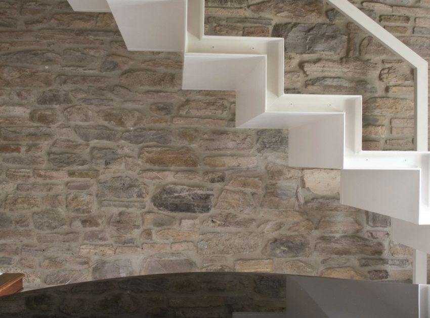 An Exquisite Home with Stunning Rough Stone Walls and Thick Ceiling Beams in Pergola, Italy by Aldo Simoncelli (15)