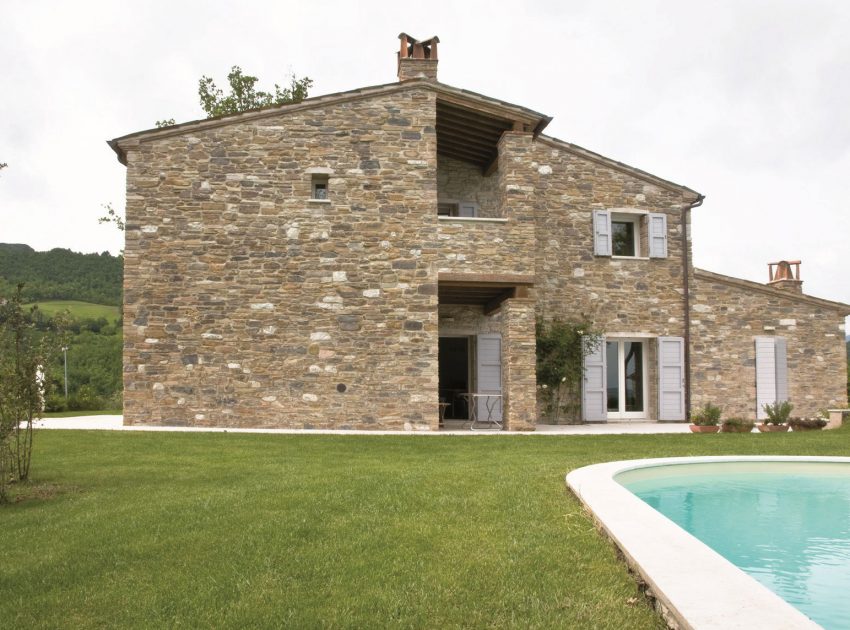 An Exquisite Home with Stunning Rough Stone Walls and Thick Ceiling Beams in Pergola, Italy by Aldo Simoncelli (2)