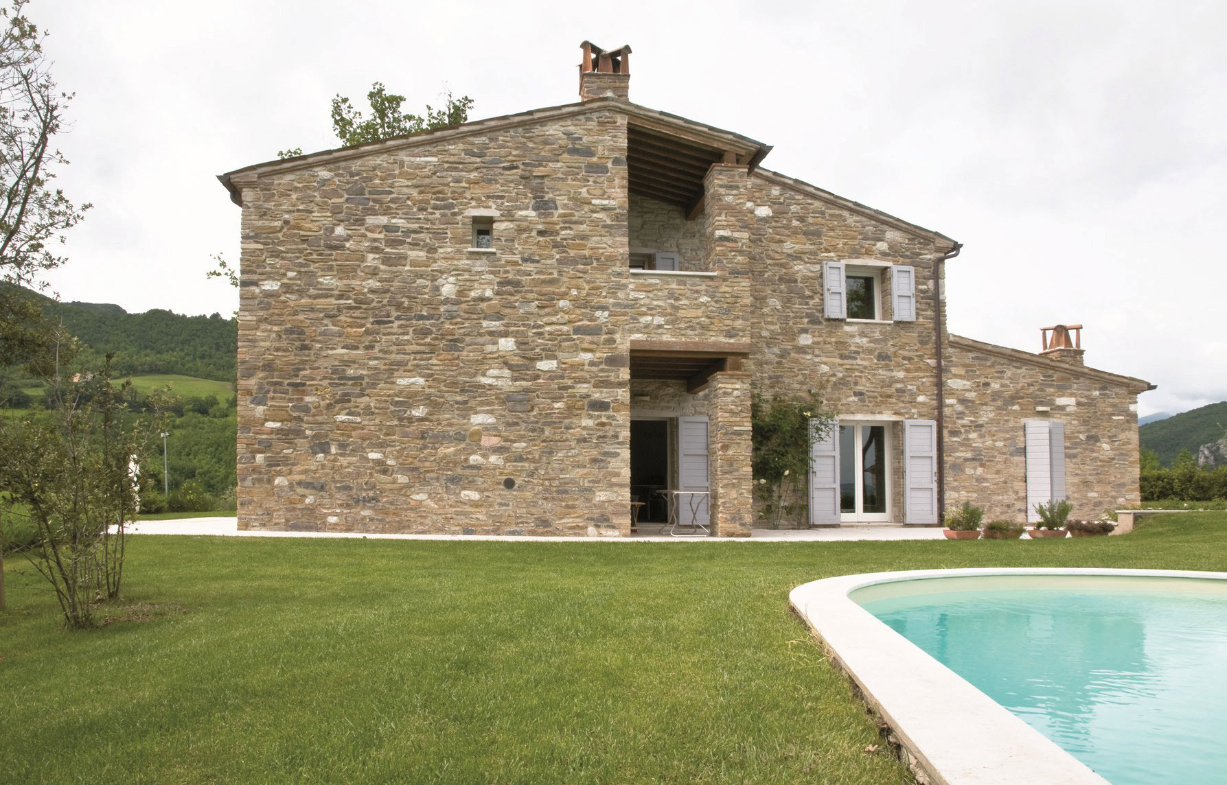 An Exquisite Home with Stunning Rough Stone Walls and Thick Ceiling Beams in Pergola, Italy by Aldo Simoncelli (2)