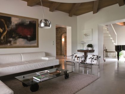 An Exquisite Home with Stunning Rough Stone Walls and Thick Ceiling Beams in Pergola, Italy by Aldo Simoncelli (6)