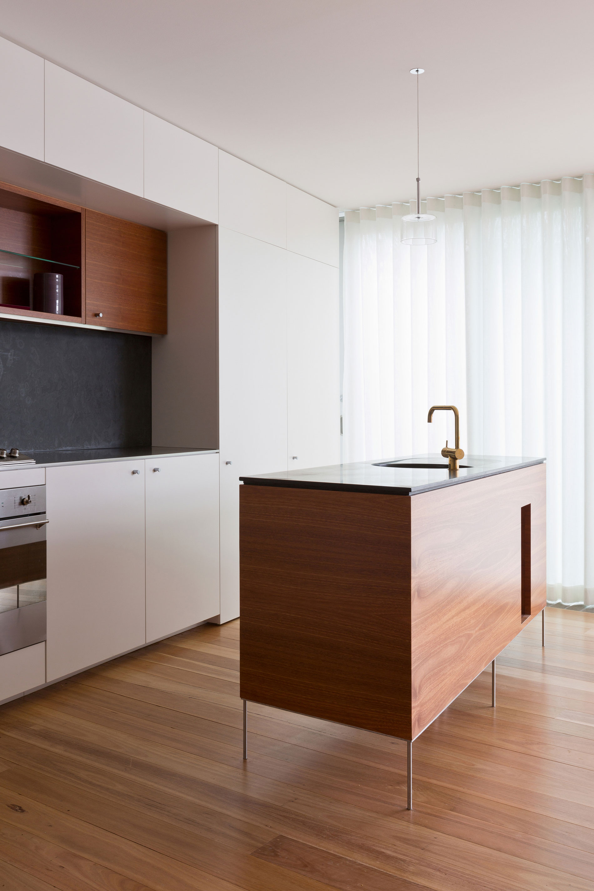 An Eye-Catching Contemporary Home with Warm and Clean Interiors in Balmain, Australia by Benn & Penna Architects (6)