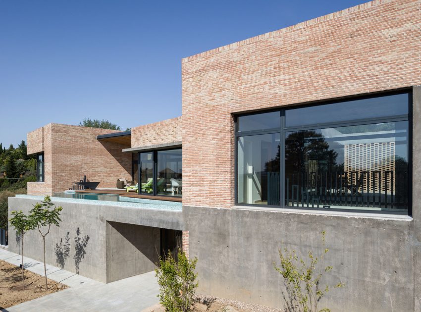 A Beautiful Modern Brick House with Stunning Skylight and Vegetation in Las Rozas by Mariano Molina Iniesta (10)