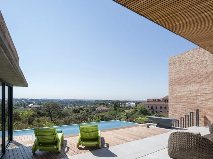A Beautiful Modern Brick House with Stunning Skylight and Vegetation in Las Rozas by Mariano Molina Iniesta (11)