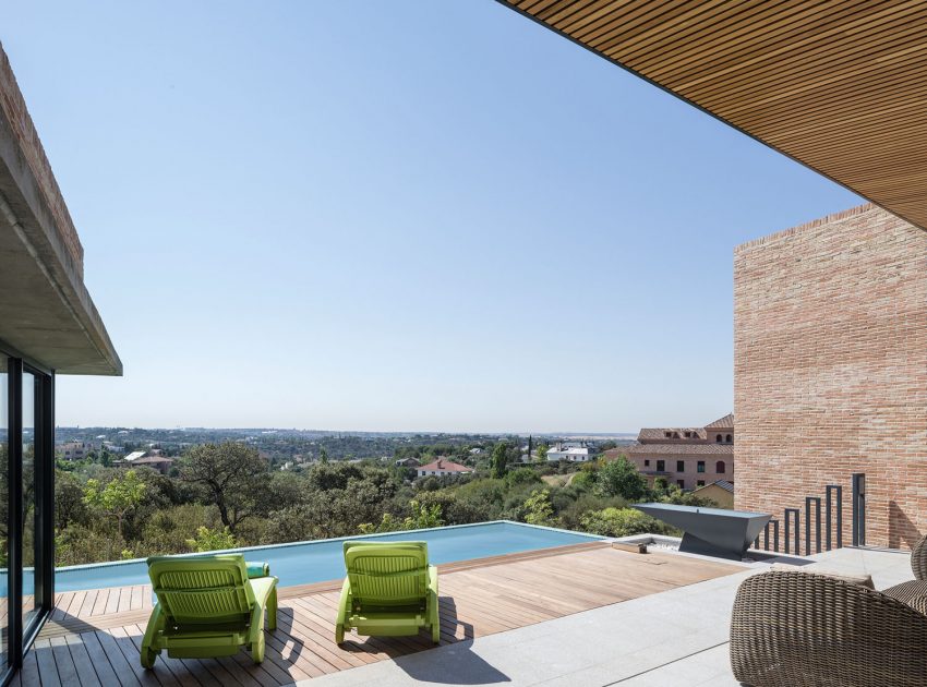 A Beautiful Modern Brick House with Stunning Skylight and Vegetation in Las Rozas by Mariano Molina Iniesta (11)