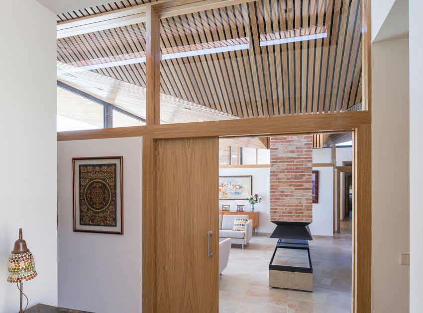 A Beautiful Modern Brick House with Stunning Skylight and Vegetation in Las Rozas by Mariano Molina Iniesta (12)