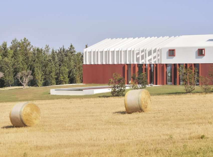 A Bright Long and Narrow Home with Contemporary and Permeable Facade in Polverigi, Italy by simone subissati architects (2)